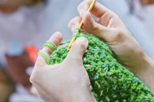 Crocheting with needle and yarn